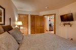 Queen bed in guest bedroom